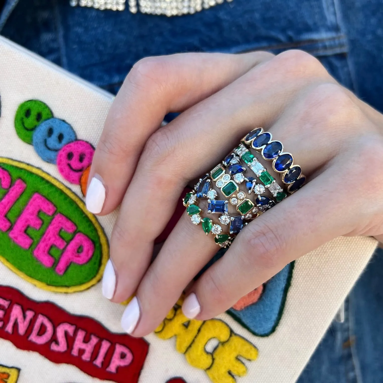 Rotating Round Diamond and Emerald Cut Sapphire Band